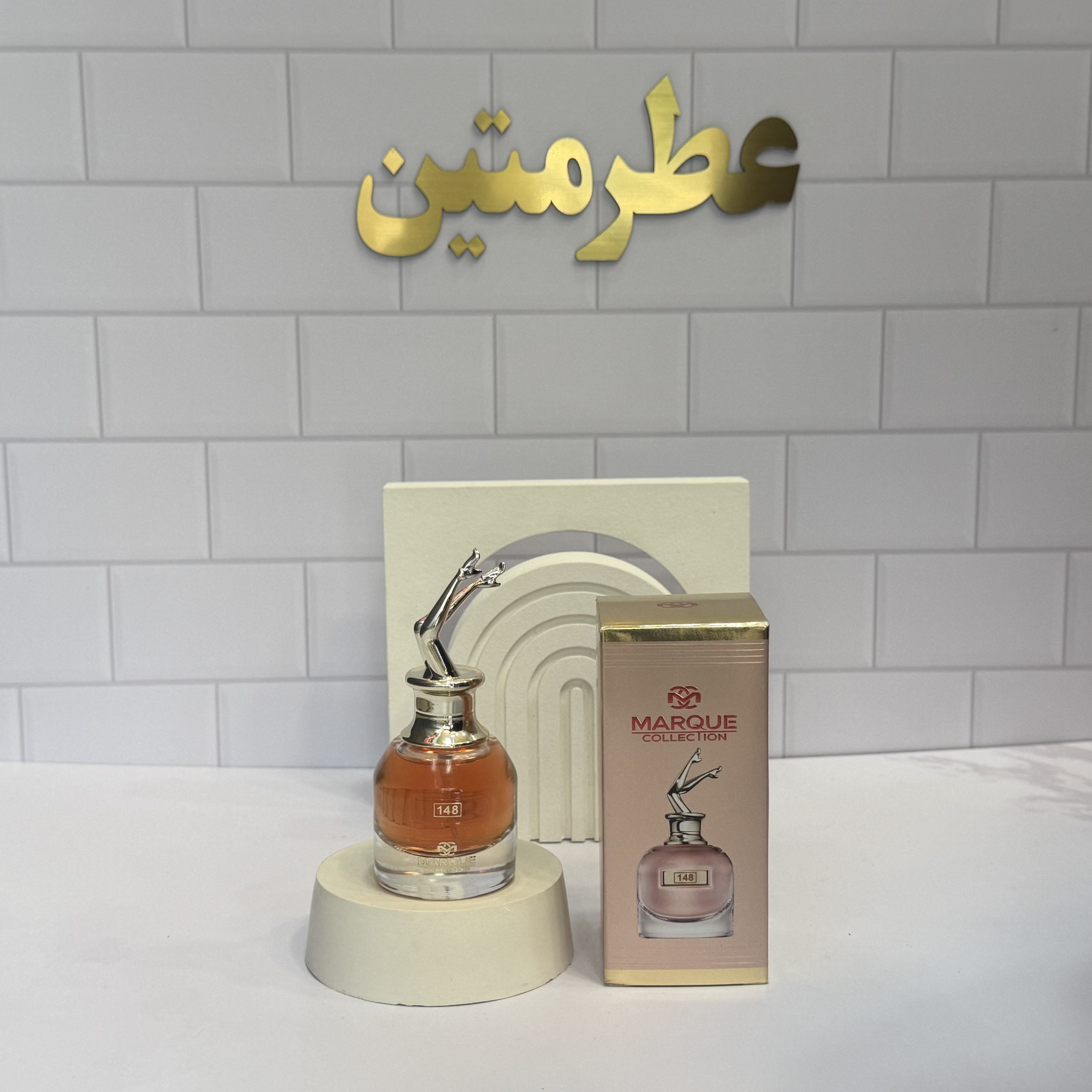 عطر ادو‌پرفیوم اسکندل زنانه شرکت مارکو کد ۱۴۸ حجم ۲۵ میل