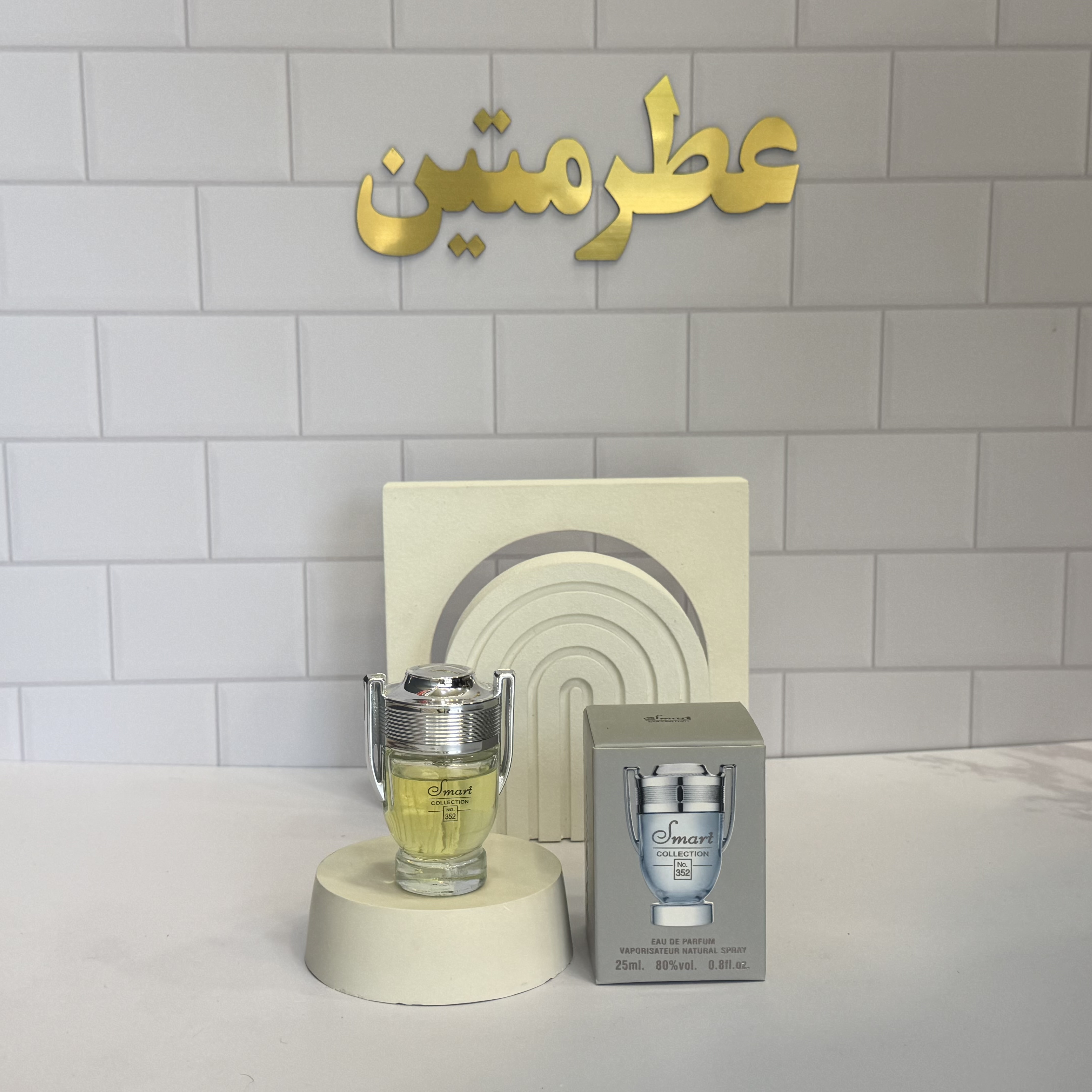 عطر ادو‌پرفیوم زنانه و مردانه اینوکتوس شرکت اسمارت کد ۳۵۲ حجم ۲۵ میل