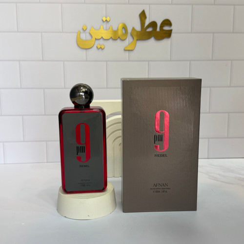 عطر ادوپرفیوم مردانه ناین پی ام ریبل شرکت افنان حجم ۱۰۰ میل