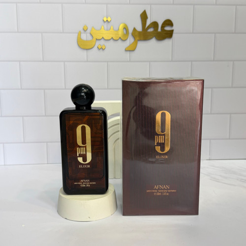 عطر ادوپرفیوم مردانه ناین پی ام الکسیر شرکت افنان حجم ۱۰۰ میل